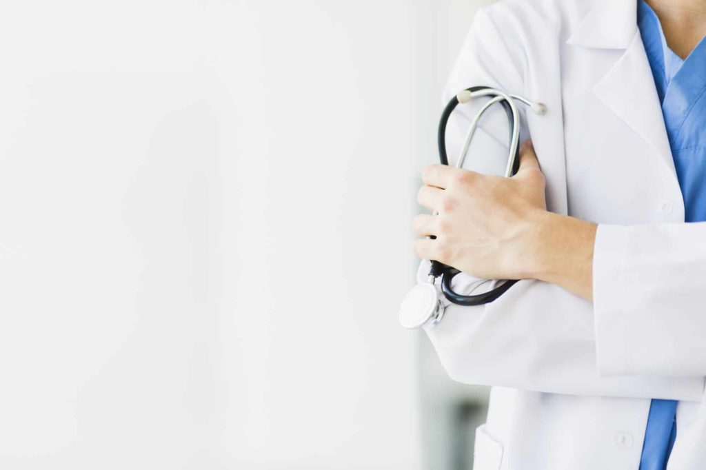 Image of a doctor holding a stethoscope.