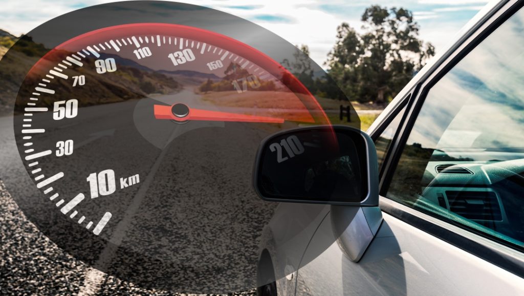 A picture of a car speeding, which could cause a car crash, and a subsequent personal injury claim.