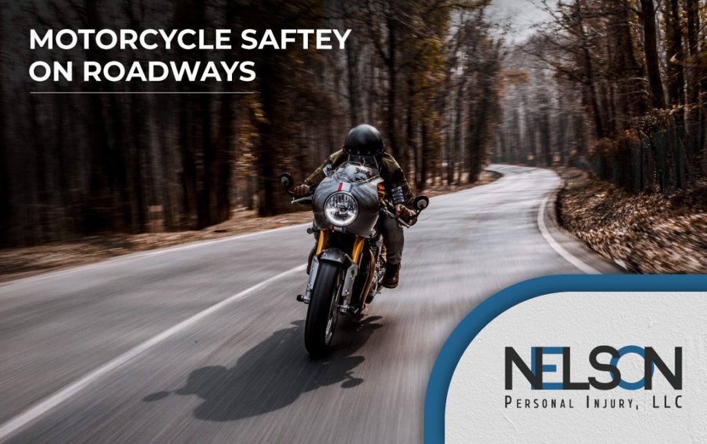 Motorcyclist on a rural road with text that reads, "Motorcycle Safety on Roadways" and Nelson Personal Injury logo