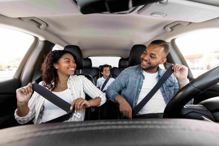 Family wearing seatbelts in car to stay safe in a Car accident