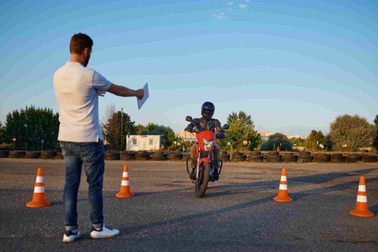 Rider practicing cones for motorcycle license Minneapolis training